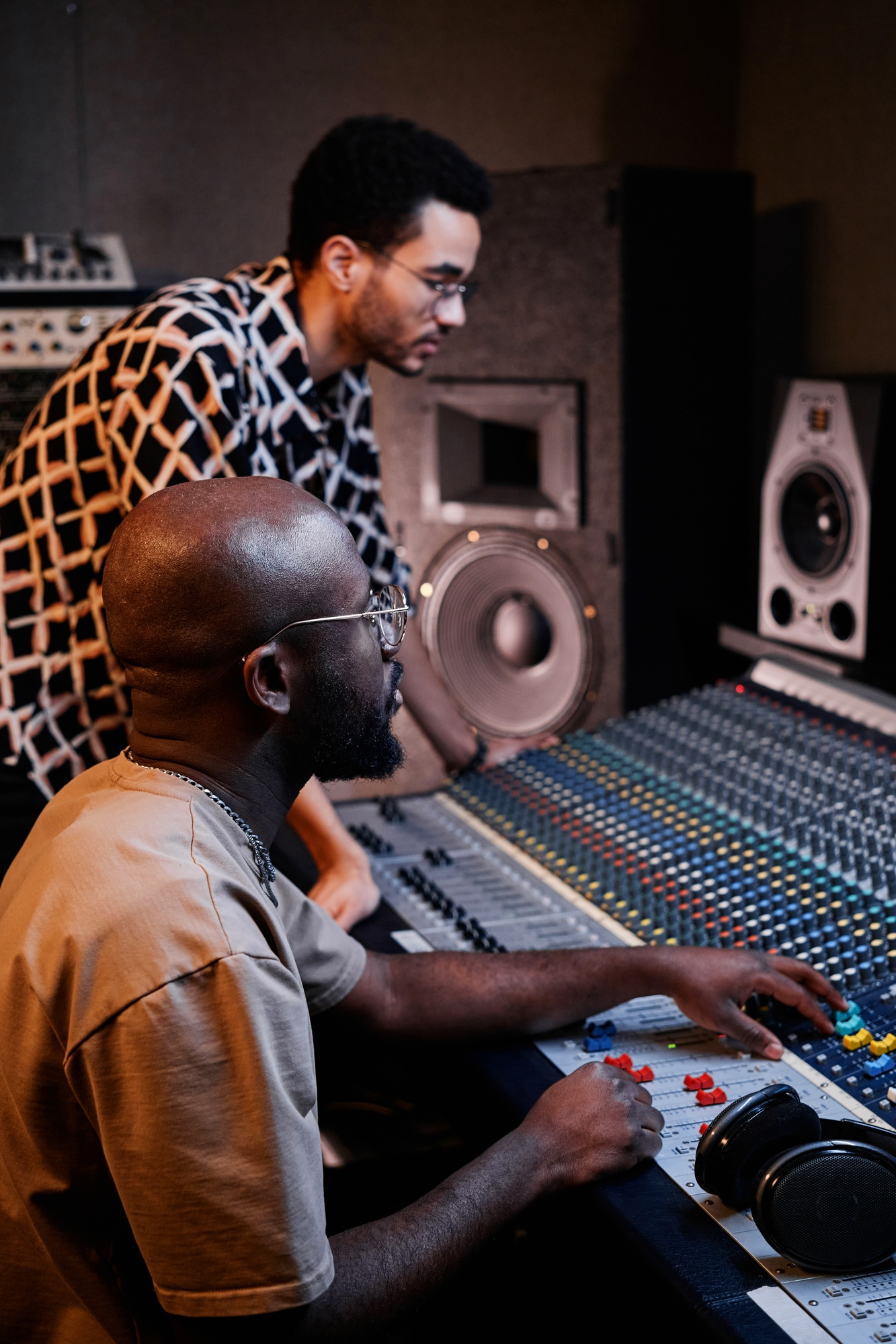 Producer And Musician In Studio